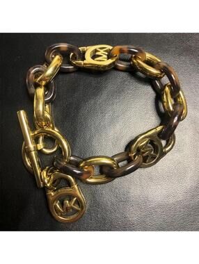 B0749 Michael Kors faux Tortoise Gold Tone Toggle Bracelet MK Logo Charm 8"